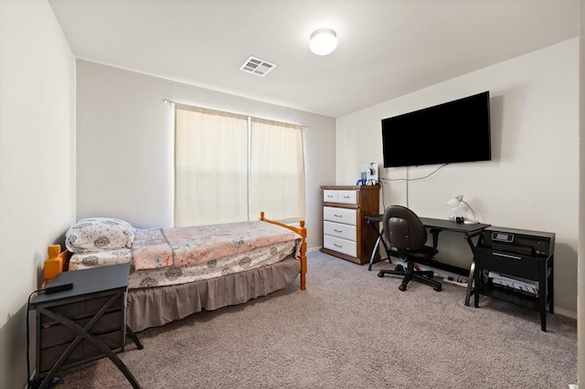 bedroom featuring visible vents and carpet