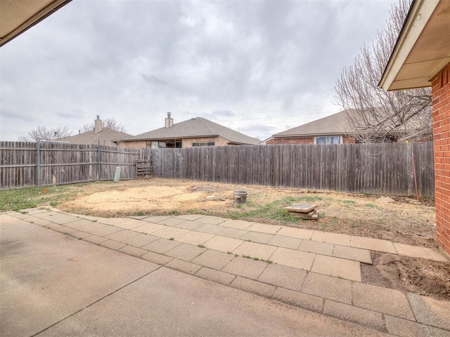 view of patio with a fenced backyard