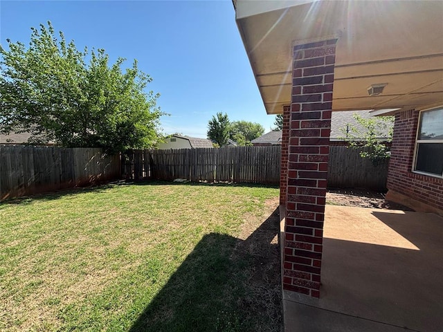 view of yard featuring a fenced backyard