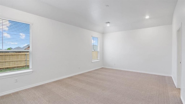 5502 Windstone Ln, Norman, OK 73072 - spare room with light colored carpet and baseboards