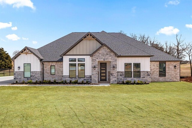 2215 Winter Creek Blvd, Blanchard, OK 73010 - modern farmhouse featuring board and batten siding, a shingled roof, and a front lawn