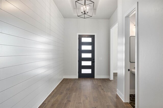 2215 Winter Creek Blvd, Blanchard, OK 73010 - entryway featuring an inviting chandelier, dark wood-style floors, and baseboards