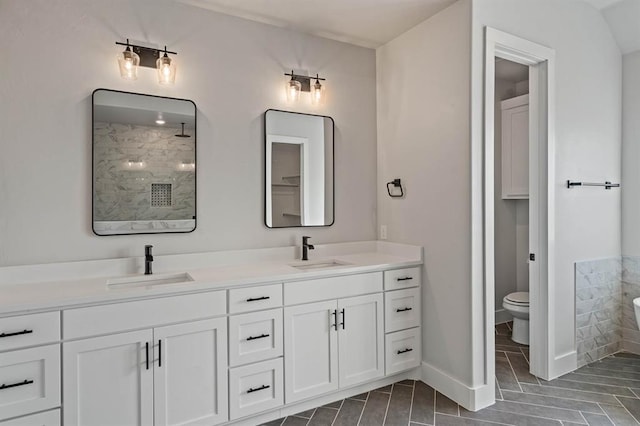 2215 Winter Creek Blvd, Blanchard, OK 73010 - full bath with a tile shower, double vanity, toilet, and a sink