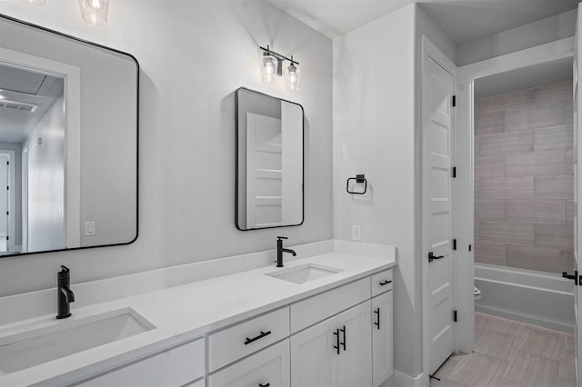 2215 Winter Creek Blvd, Blanchard, OK 73010 - bathroom featuring double vanity, visible vents, toilet, and a sink