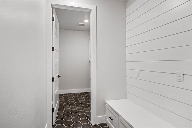 2215 Winter Creek Blvd, Blanchard, OK 73010 - mudroom with visible vents, baseboards, and dark tile patterned flooring