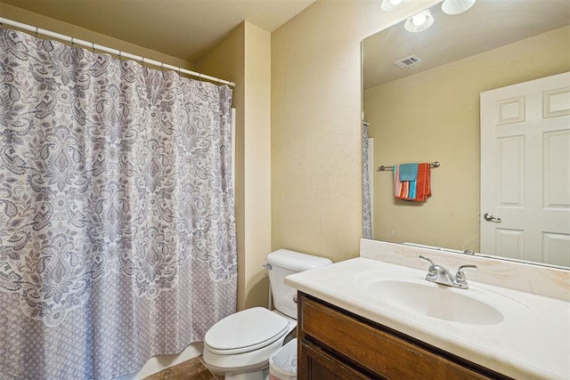 18761 Council Ave, Lindsay, OK 73052 - bathroom with toilet, vanity, and a shower with curtain