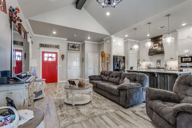1624 NE 32nd St, Moore, OK 73160 - living room with recessed lighting, ornamental molding, high vaulted ceiling, and light wood-type flooring
