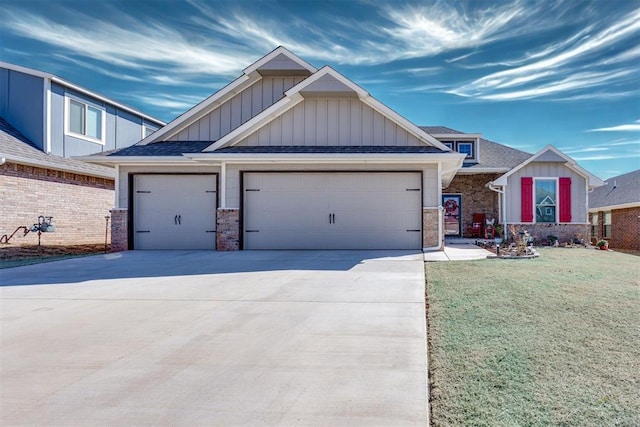 1624 NE 32nd St, Moore, OK 73160 - craftsman-style house featuring board and batten siding, an attached garage, concrete driveway, a front lawn, and roof with shingles