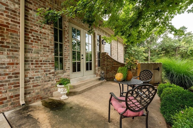 1514 Duxsford Ct, Edmond, OK 73034 - view of patio featuring french doors