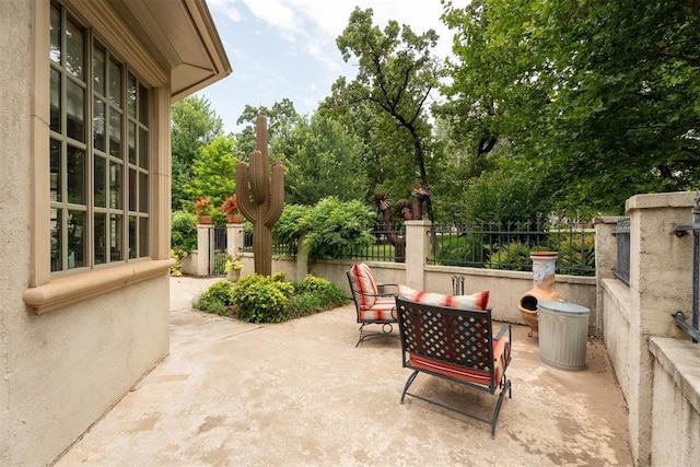 1514 Duxsford Ct, Edmond, OK 73034 - view of patio / terrace with view of scattered trees
