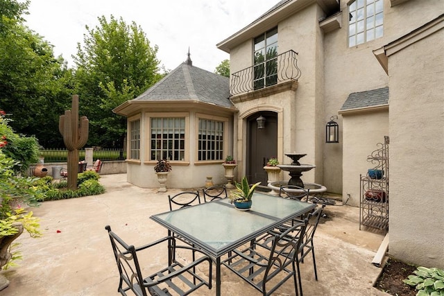 1514 Duxsford Ct, Edmond, OK 73034 - view of patio / terrace featuring outdoor dining area