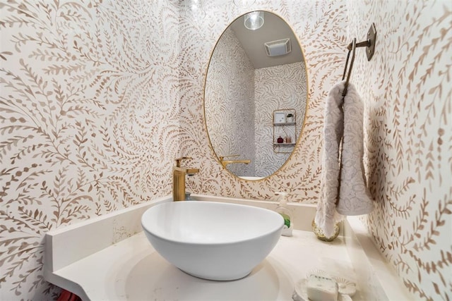 1514 Duxsford Ct, Edmond, OK 73034 - bathroom with wallpapered walls and vanity