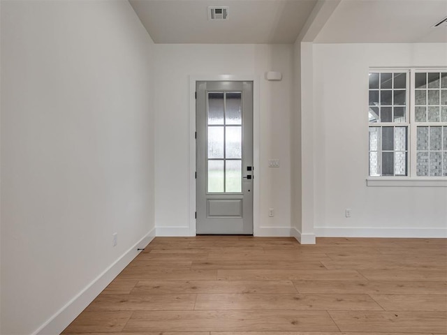 77 Orchid Ct, Piedmont, OK 73078 - entryway with light wood-style flooring and baseboards