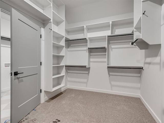 77 Orchid Ct, Piedmont, OK 73078 - spacious closet featuring light colored carpet
