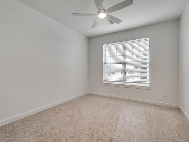 77 Orchid Ct, Piedmont, OK 73078 - unfurnished room with light carpet and a ceiling fan