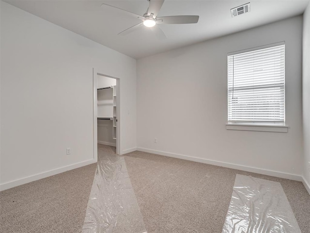 77 Orchid Ct, Piedmont, OK 73078 - spare room with light carpet and ceiling fan
