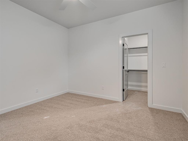 77 Orchid Ct, Piedmont, OK 73078 - unfurnished room with light colored carpet and a ceiling fan