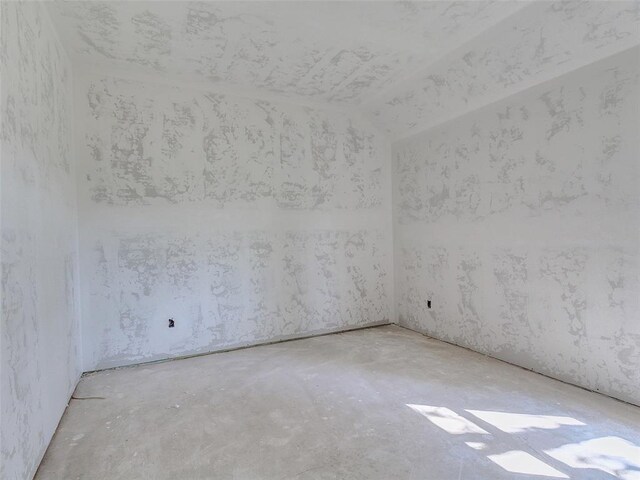 9070 Oak Tree Cir, Edmond, OK 73025 - unfurnished room with concrete flooring