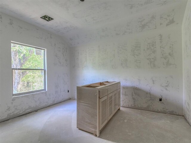9070 Oak Tree Cir, Edmond, OK 73025 - unfurnished room with lofted ceiling