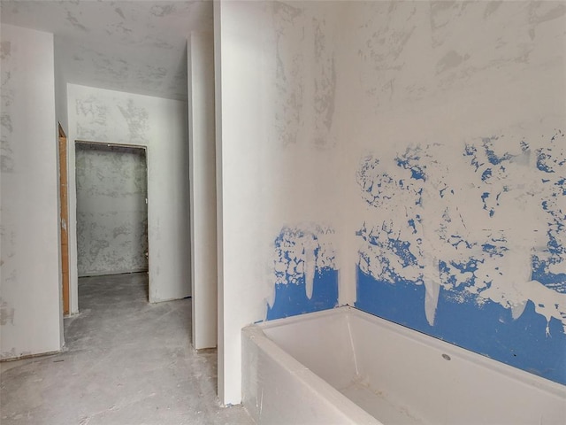 9070 Oak Tree Cir, Edmond, OK 73025 - full bathroom featuring a garden tub and concrete floors