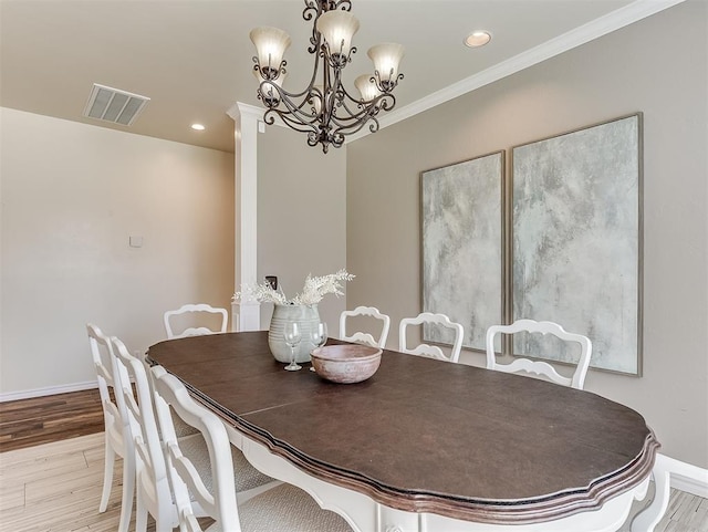 dining room with recessed lighting, light wood-style flooring, baseboards, visible vents, and a notable chandelier