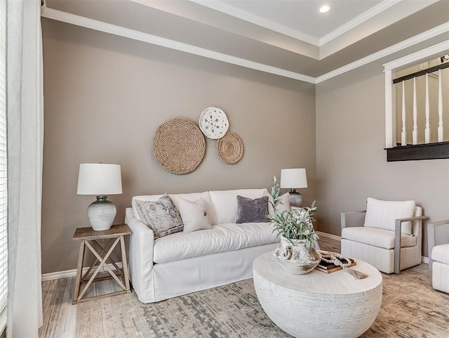 living room with wood finished floors, crown molding, recessed lighting, and baseboards
