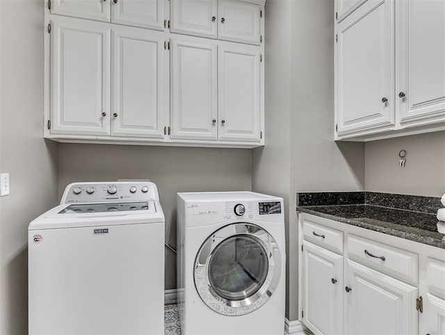 laundry room featuring cabinet space and independent washer and dryer