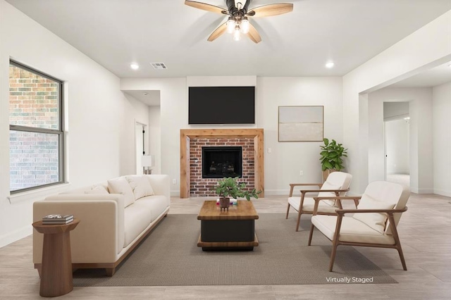 11713 NW 105th St, Yukon, OK 73099 - living area featuring ceiling fan, a fireplace, baseboards, and recessed lighting