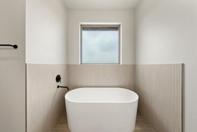 11713 NW 105th St, Yukon, OK 73099 - full bathroom featuring a freestanding bath and wainscoting