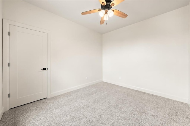 11713 NW 105th St, Yukon, OK 73099 - carpeted empty room with baseboards and a ceiling fan
