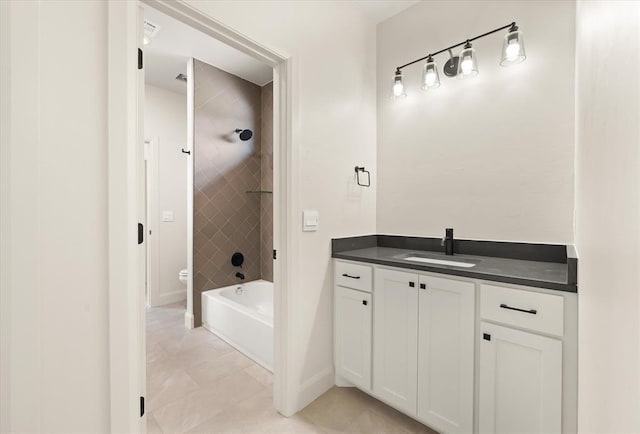 11713 NW 105th St, Yukon, OK 73099 - bathroom with vanity, toilet, shower / tub combination, baseboards, and tile patterned flooring