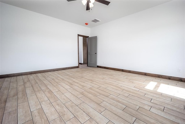 1431 County Road 2977, Blanchard, OK 73010 - spare room with a ceiling fan and light wood-style flooring