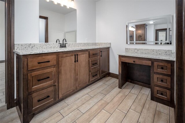 1431 County Road 2977, Blanchard, OK 73010 - bathroom featuring wood finished floors and vanity