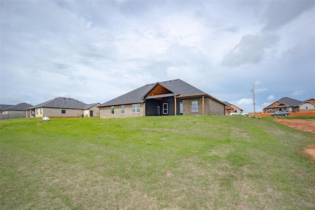 1431 County Road 2977, Blanchard, OK 73010 - back of house featuring a lawn