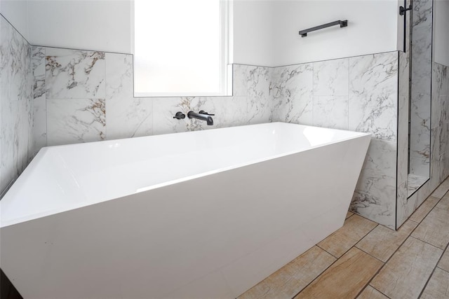 1431 County Road 2977, Blanchard, OK 73010 - full bath featuring a freestanding tub and tile walls
