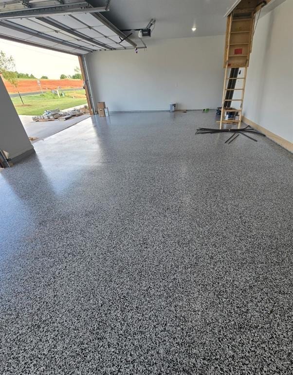 1431 County Road 2977, Blanchard, OK 73010 - garage with a garage door opener and recessed lighting