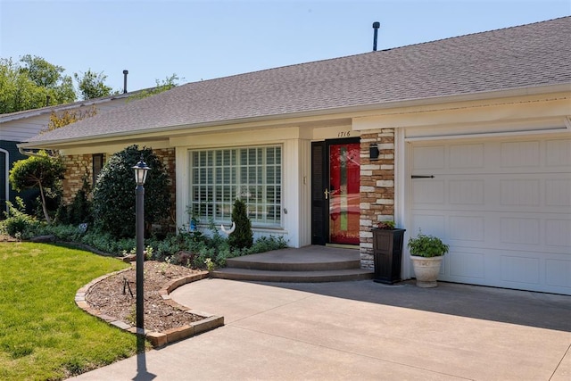 1716 Westminster Pl, Nichols Hills, OK 73120 - doorway to property with driveway, a shingled roof, a yard, stone siding, and an attached garage