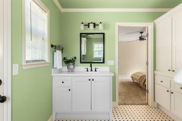 1716 Westminster Pl, Nichols Hills, OK 73120 - full bathroom featuring vanity, crown molding, connected bathroom, and tile patterned floors