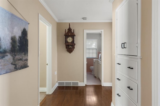 1716 Westminster Pl, Nichols Hills, OK 73120 - hall with dark wood-type flooring and ornamental molding