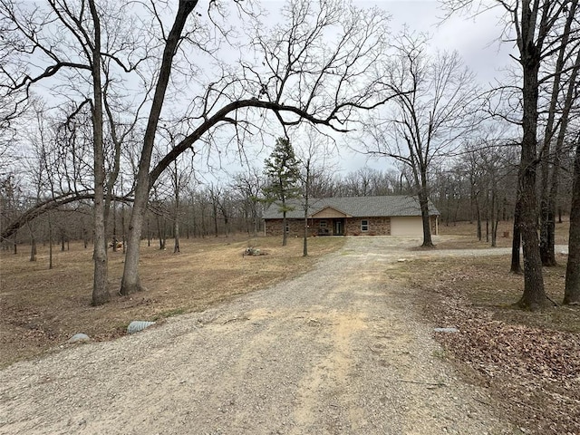 114495 S 4296th Rd, Porum, OK 74455 - exterior space featuring an attached garage and dirt driveway