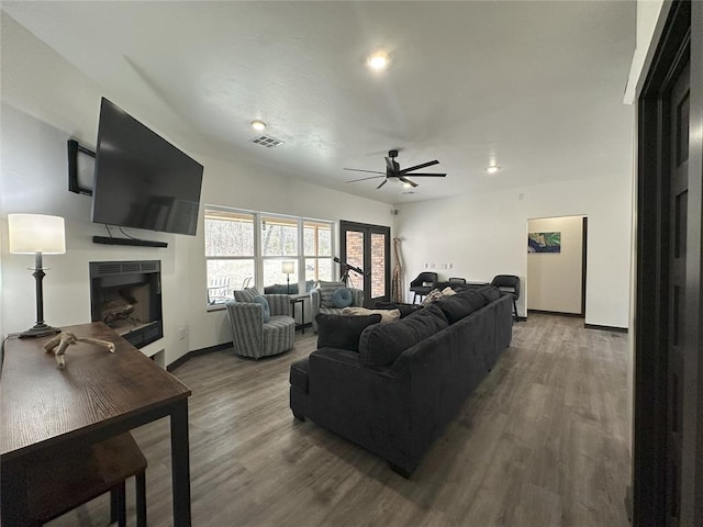 114495 S 4296th Rd, Porum, OK 74455 - living area with a ceiling fan, wood finished floors, a fireplace, and visible vents