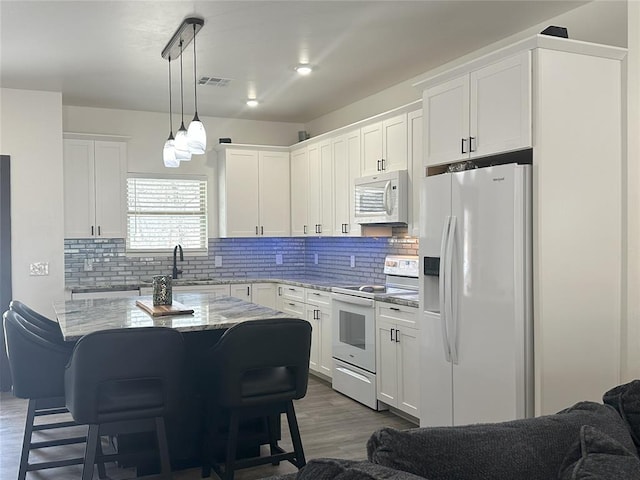 114495 S 4296th Rd, Porum, OK 74455 - kitchen with visible vents, white appliances, white cabinetry, a sink, and light stone counters