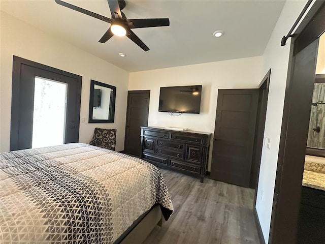 114495 S 4296th Rd, Porum, OK 74455 - bedroom with recessed lighting, ceiling fan, and wood finished floors