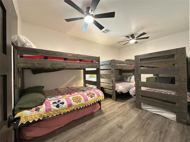 114495 S 4296th Rd, Porum, OK 74455 - bedroom featuring visible vents, wood finished floors, and ceiling fan