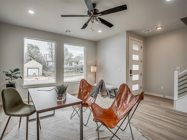 interior space with recessed lighting, baseboards, visible vents, and light wood-type flooring