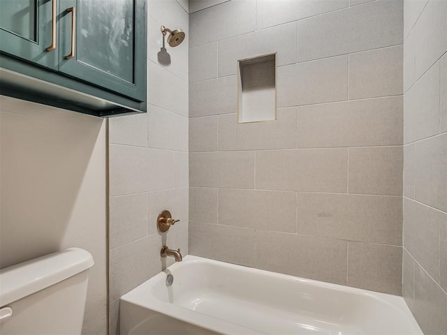 bathroom featuring toilet and shower / bathtub combination