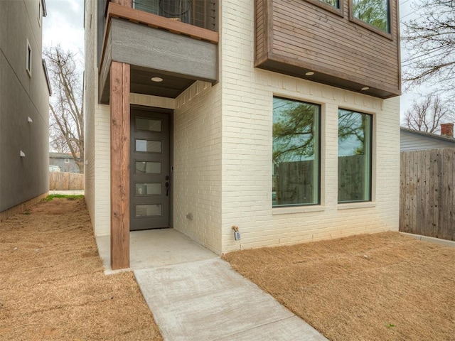 1308 NW 11th St, Oklahoma City, OK 73106 - entrance to property featuring brick siding and fence