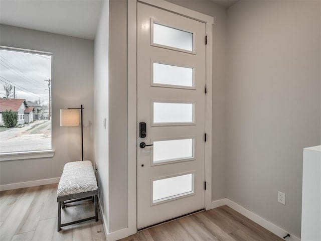 1308 NW 11th St, Oklahoma City, OK 73106 - foyer featuring light wood-style floors and baseboards