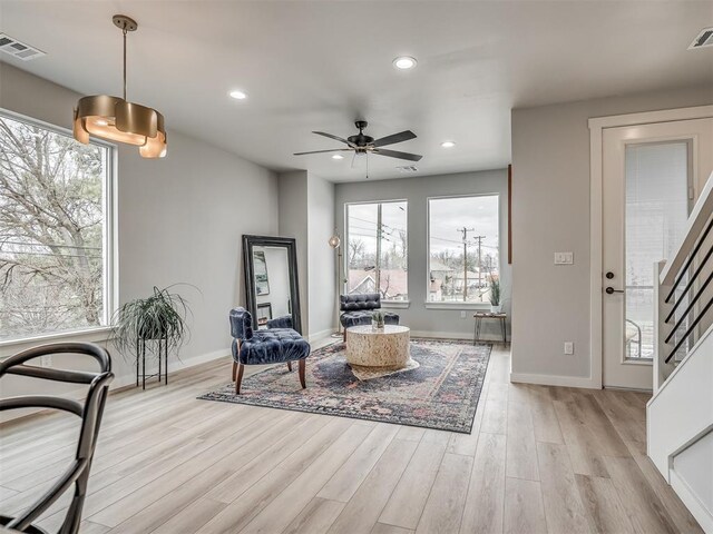 1308 NW 11th St, Oklahoma City, OK 73106 - sitting room with plenty of natural light, light wood finished floors, baseboards, ceiling fan, and recessed lighting