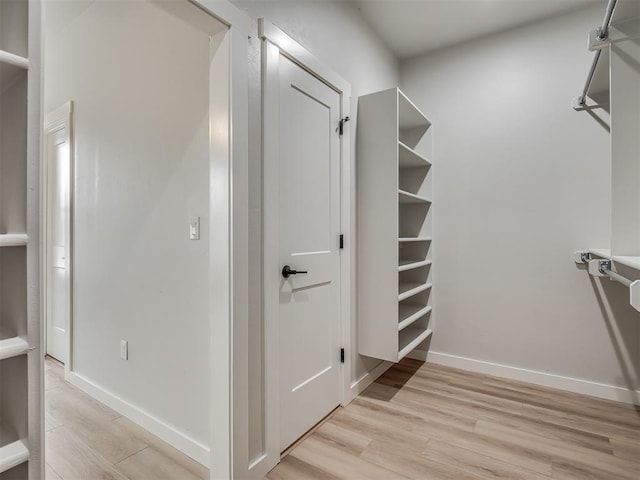1308 NW 11th St, Oklahoma City, OK 73106 - walk in closet with light wood finished floors